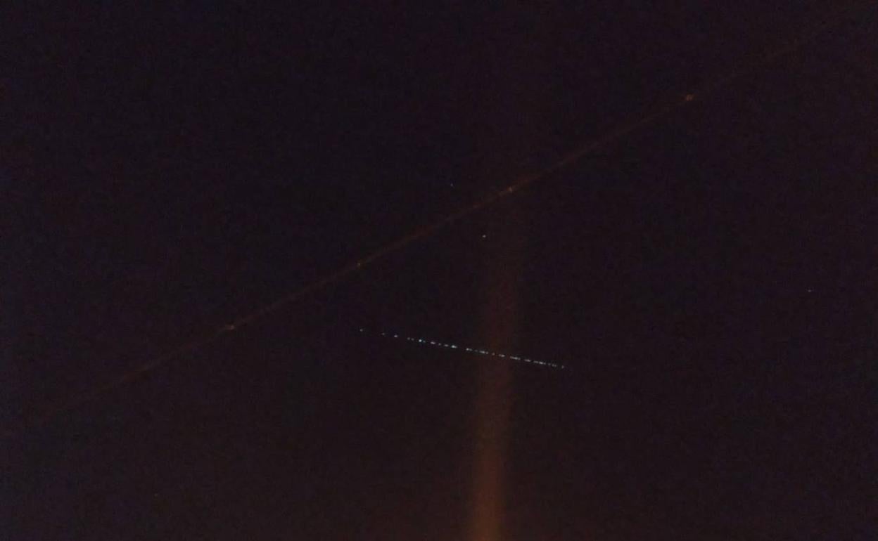 What was the strange line of lights in the night sky visible from